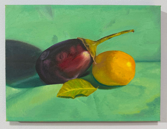 Original 9 by 12 inch oil painting titled Unlikely Best Friends by Kael Von, depicting a deep purple eggplant, a bright yellow lemon, and a green leaf in still life