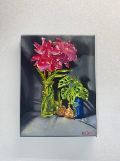 Original 9 by 12 oil painting by Kael Von with pink flowers, monstera leaves, glass bottles and a blue pot